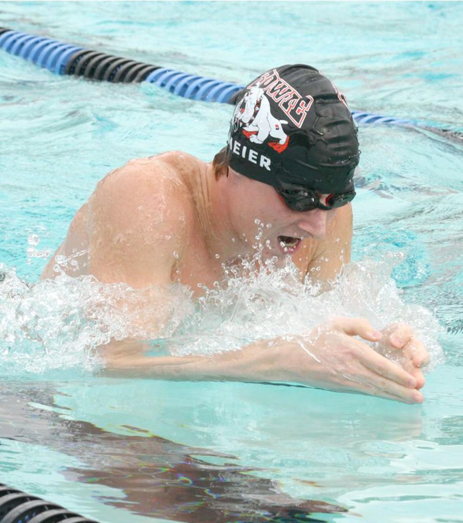 Senior Chance Meier swims the 200 breaststroke at the swim team’s meet against Anderson and Austin High. Meier won his race.