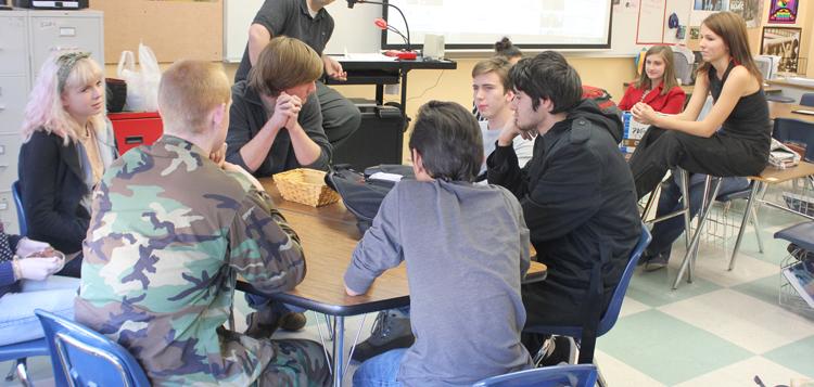 The Bowie Secular Student Alliance meets with Christians in B206 with sponsor Chris Lyon to discuss their religious beliefs. Members of the club debate over the existence of God, Jesus Christ and whether or not to follow the bible.