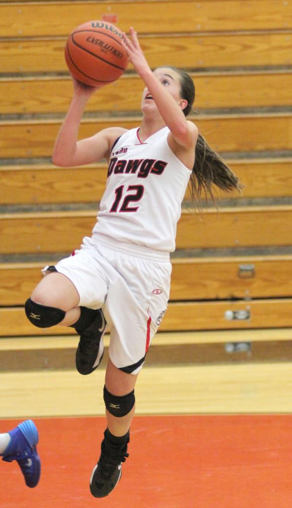 Sophomore+Amber+Lotz+leaps+for+a+basket.+She+had+her+best+game+of+the+year+against+Leander+with+seven+points+and+one+steal.