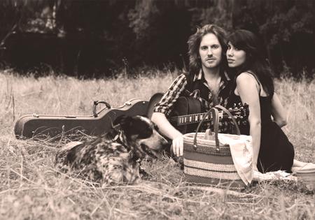 (Right to left) Chris Wakes and Miranda Dawn pose in a meadow for their album cover photo known as Golden Heart. The album, titled Golden Heart, was released on June 11, 2012.