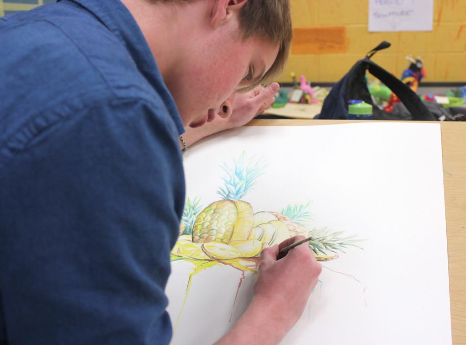 Senior Jordan Brittain creates a piece of art for the VASE competition. This was the first time that Brittain had entered a piece into the Visual Arts Scholastic Event.
