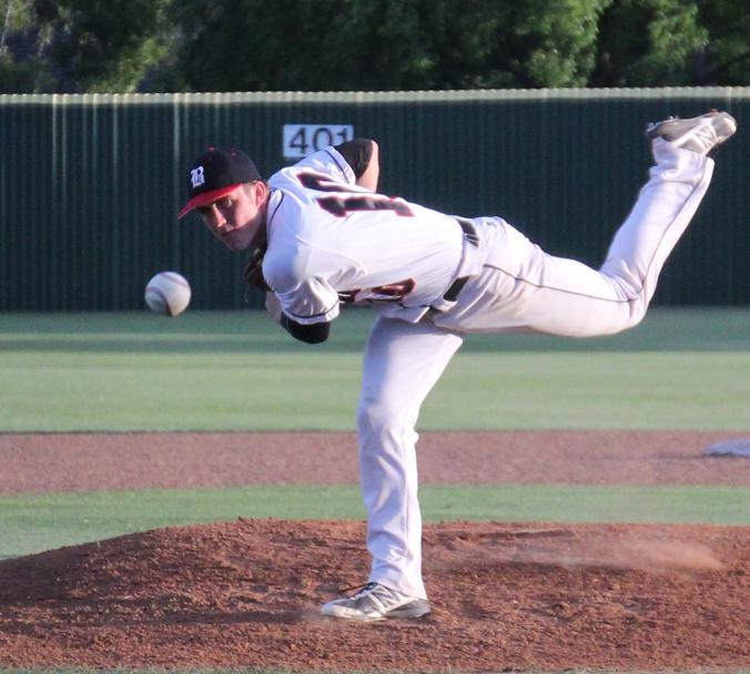 Junior Kyle Gray throws a pitch during the team’s second game against McNeil High School. The team won the game with a final score of 3-0.
