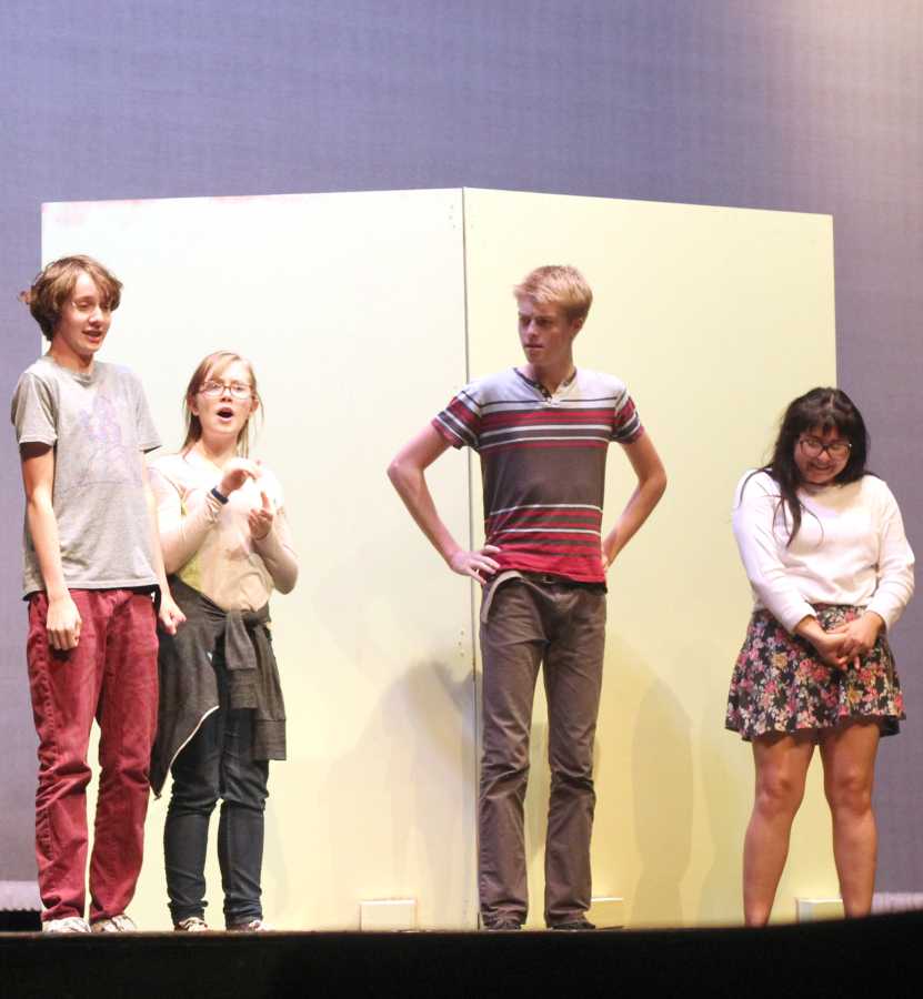 The show must go on:  Juniors Simon Thomas, Hannah Rutt , Andy Moe, and Olivia Lambardo rehearse for “The Princess, The Poet, and the Little Grey Man.” Reheasals are every day after school from 5-6:30 p.m.  Photo by Jasmine Correa