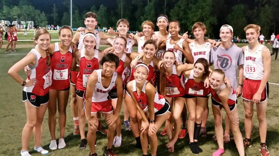 Cross Country runners pose after an exhausting day at The Woodlands. Runners  were excited by how well they did for their first race of the year. 