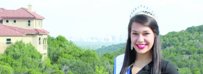 Posing in front of the downtown Austin skyline, senior Jasmine Correa flashes a red-lipsticked smile.  Correa took home four awards from the Teen Texas Belleza Pageant: Miss Teen Photogenic, Best in Fashion, Eleganicia, and Best Interview.