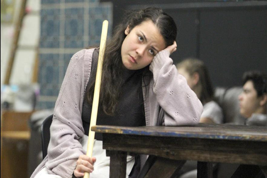 Senior Juliana Davis is overcome with sadness and despair as she perfects her character’s personality on set. The cast members rehearsed their performances throughout many late week night hours in preparation for the UIL Spring shows.