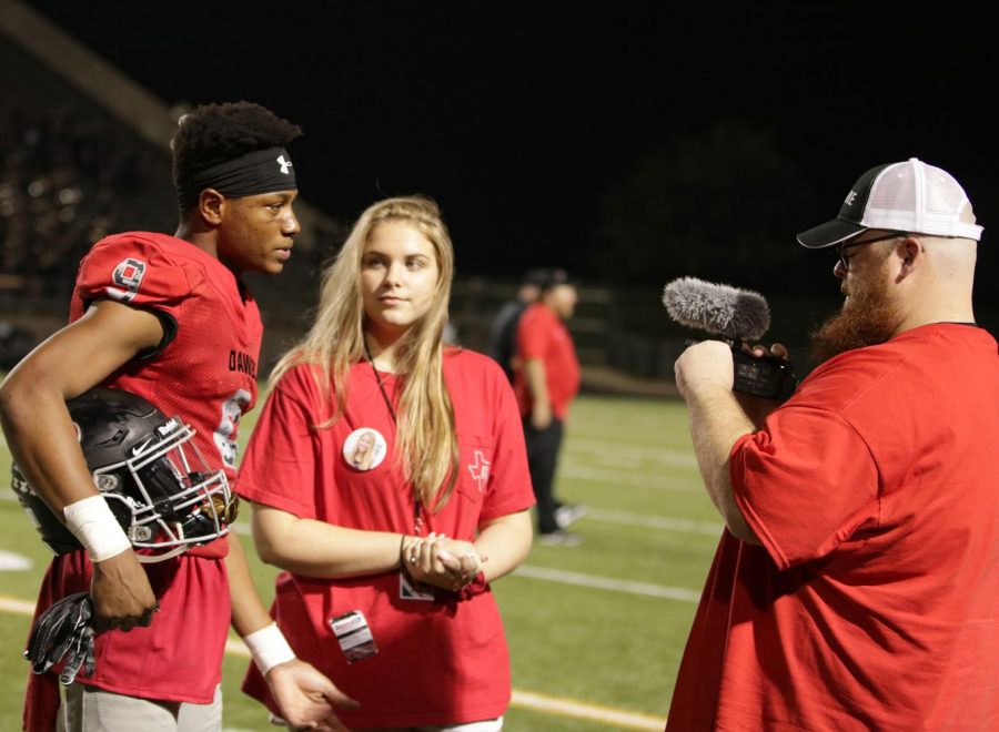 Junior reports football games through Fanstand coverage