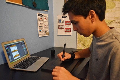HUMOR IN PROGRESS: Sophomore Abbas Akhtar creates his next comic with a drawing tablet. Most of his comics incorporate relatable humor.