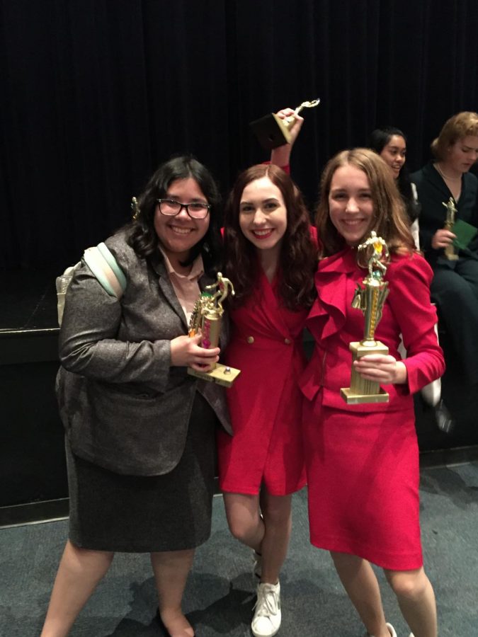 Senior Amy Shreeve, pictured far right by junior Ashlyn Dahl (center), and senior Brianna Rodriguez (far left) was one of the many students who competed at the Speech and Debate tournament this weekend at Anderson High School. James Bowie High School performed exponentially well in the tournament, JBHS had multiple students win individual awards, become congressional debate finalists, and had two new state qualifiers, one being Amy Shreeve.