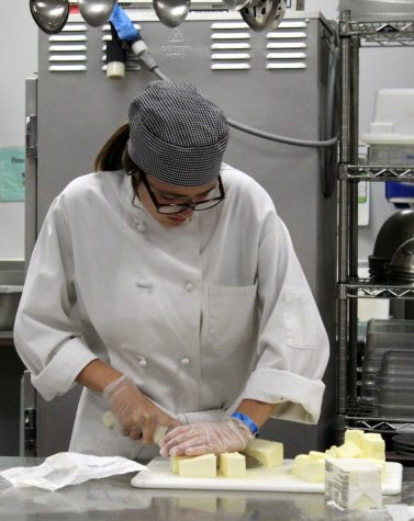 Bowie Culinary student, Emily Yoder, prepares for the annual Bowie Bakery. 