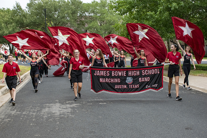 MARCHING+MADNESS+Parading+through+various+neighborhoods%2C+the+marching+band+serenades+residents+in+hopes+of+raising+money+for+their+program.+The+band+students+raised+about+%2454%2C000%2C+which+went+to+new+uniforms.+