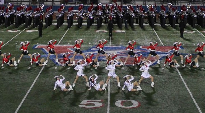 The Bowie Silver Stars dance team concludes their halftime performance at the 11/9/18 Bowie vs. Westlake game to the song ‘How the West Was Won.’ The Silver Stars practice almost every morning to prepare for their halftime performances during games, and the Officer Line (seen in white) will be performing in the 92nd annual Macys Day Parade on November 22nd.