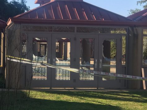 The glass of these doors have been broken to the left of the main entrance, and many other doors around campus have also been vandalized in a similar fashion.