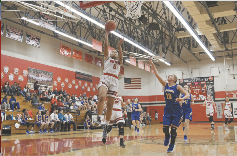 Senior Hailey Atwood leaps up to score a lay-up. Atwood was nominated for McDonald’s All-American. 
