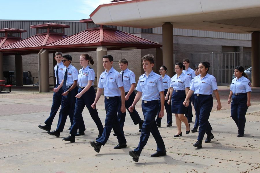 Within the JROTC class, students are taught leadership and military skills for half of each class on Mondays through Thursdays. On Fridays, JROTC practices outside.