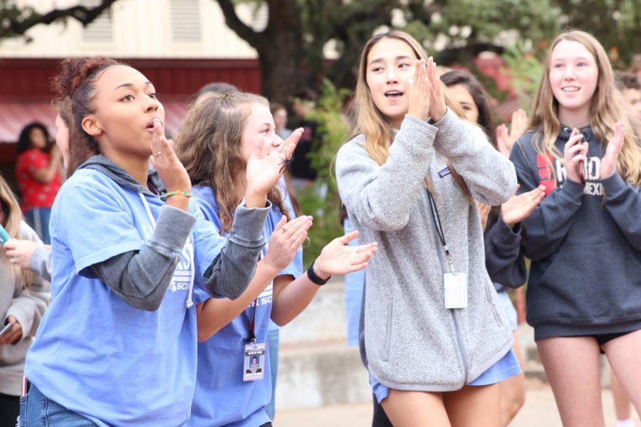 Senior leadership students Lisa Wilkerson, Payton Lord, and Kendall Oh dance in the pit in hopes of bringing the student body together. The Fall Festival was in the courtyard after the PSAT and was made to promote a positive and welcoming environment on campus. 