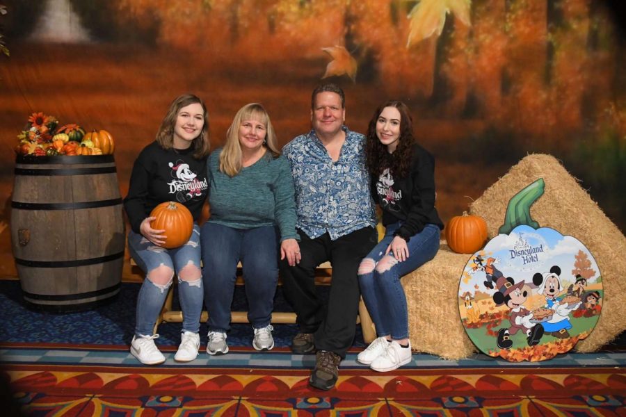 FAMILY VALUES: sophomore Lindsay Dahl [left] poses with her parents [center] and senior Ashlyn Dahl [right]. Going to Disneyland is a staple of their family traditions.

Image courtesy of Lindsay Dahl