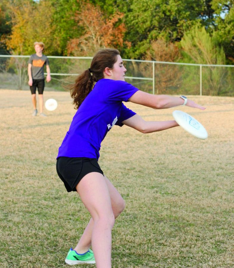 CAPTAIN STATUS: Senior Caroline Myers catches the frisbee during practice. She played ultimate in middle school before joining the Bowie team.