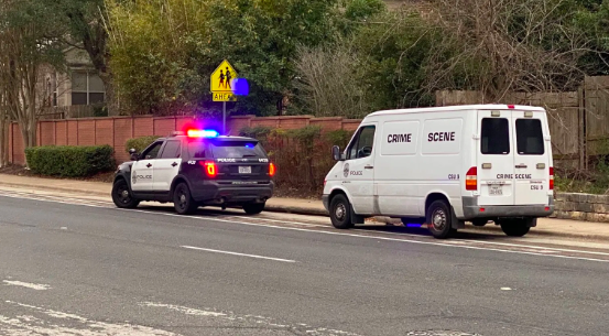 Scene from the attempted abduction that occurred on Friday, January 10th. Ashley Cuellar was jogging on escarpment when a driver tried to abduct her. Photo courtesy to KXAN. 



