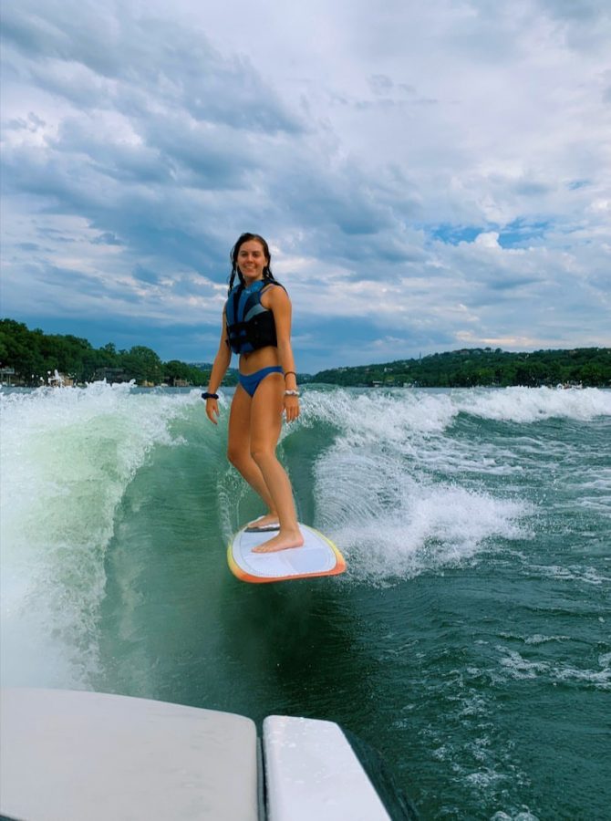 Brooke Garner is a junior who has a hobby of surfing. “I started surfing when I was four years old,” Garner said. “My family owned a boat back then, so my dad was able to coach me. Currently I surf behind a boat that we rent out on Lake Travis or behind a cable at a cable park I go to called the Texas Ski Ranch.” Photo Courtesy of Brooke Garner.