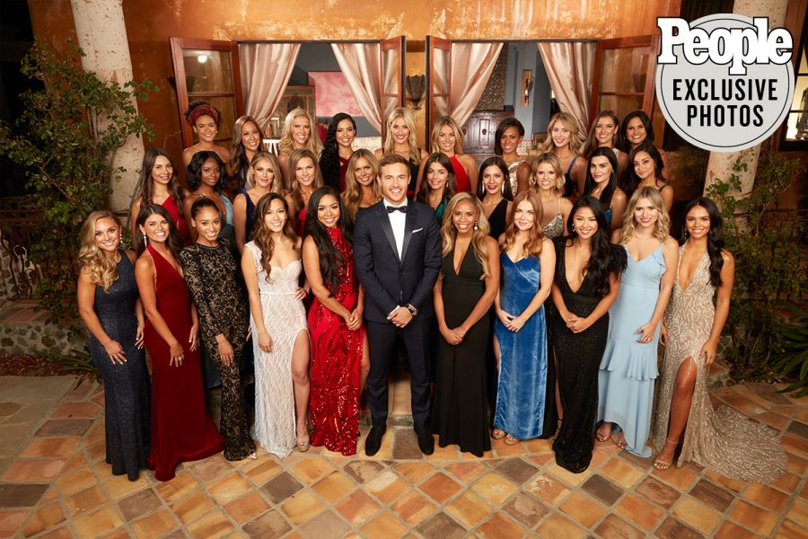 This seasons Bachelor, Peter Weber, smiles with the thirty contestants all fighting for his heart. 