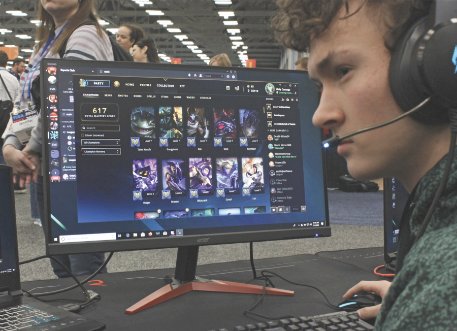 DEATHMATCH: Eli Buerger plays League of Legends at the eSports competition. He is a member of the eSports club and helped the team beat Austin High 36-1. 