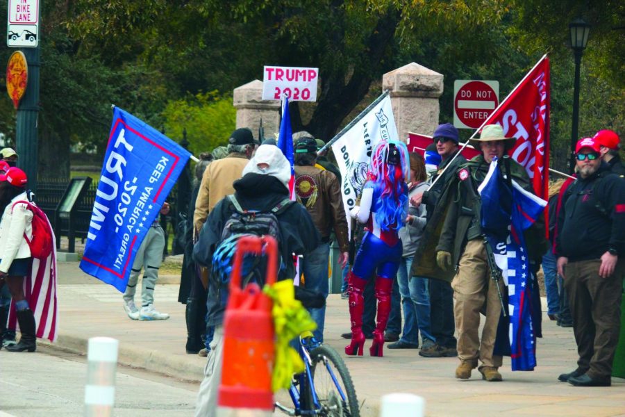 DONT STOP BELIEVING: A group of Trump supporters protest the election results outside of the Texas State Capitol on Dec. 6. Trump and other Republican groups have filed over 40 lawsuits challenging the results of the presidential election. 