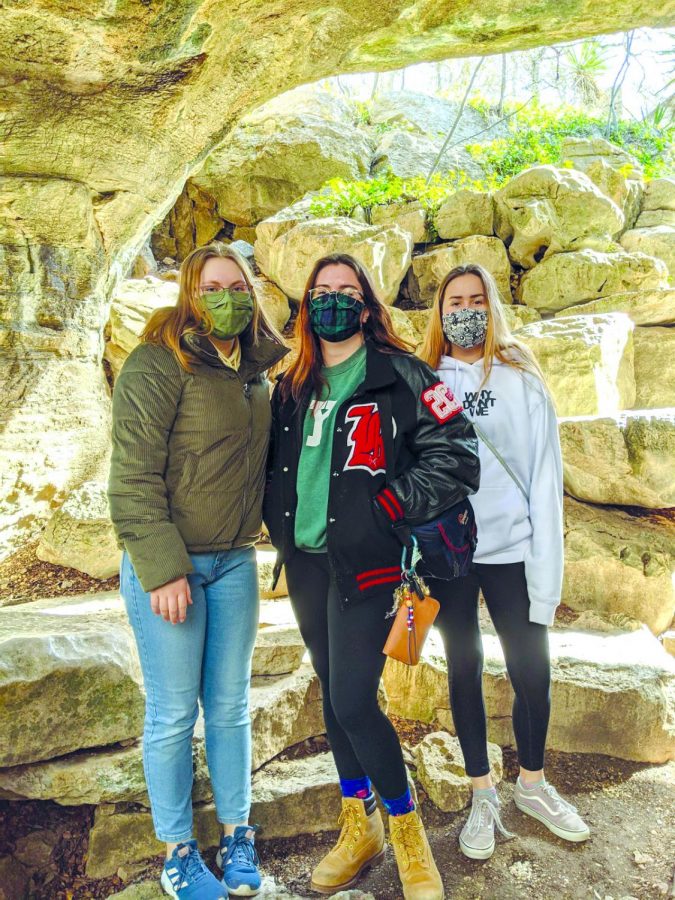 WITH HER HOST FAMILY: Sophomores Sophia Rockitt, Emily Williams and graduate Megan Williams hike in Austin. The Williams family has been in contact with Rockitt since last May. 
