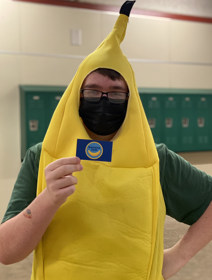 BUSINESS CARD IN HAND: Sam Frederick refers to himself as the Chief Banana Officer.