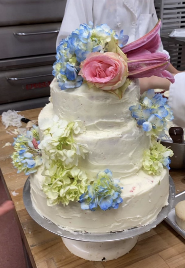 THREE, TWO, ONE BAKE: Culinary students bake three layer wedding cakes during class. After they were completed, chef Bugni voted to have at her wedding cake rehearsal. 