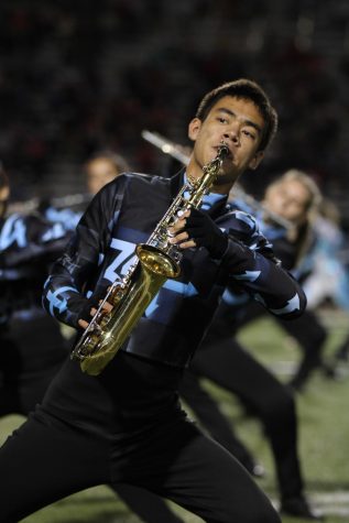  Senior Corey Chrudimsky plays the saxophone in a Bowie Outdoor Performing Ensemble performance. Chrudimsky is one of four students selected to participate in the Rose Bowl parade band. 