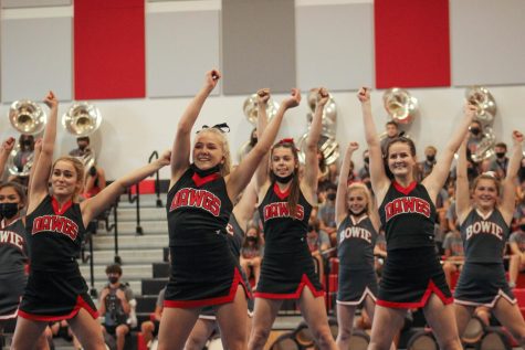 SMILES FOR MILES: Bowie’s Varsity and JV Cheer team performing during the homecoming prep rally. During the UIL competition the team placed 23rd out of 80 teams competing overall. 