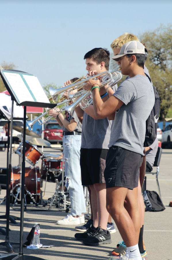 SHOW TIME: Different organizations at Bowie were here dropping off items and holding booths to raise awareness and help volunteer such as, Silver Stars, Lacrosse, Pals, and Star Dancers. Along with volunteering groups and opportunities, the Bowie band put on an entertaining show featuring many different instruments. 