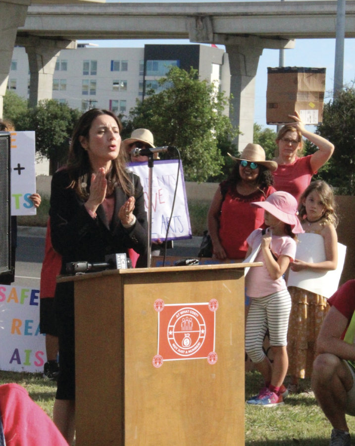PASSIONATELY SPEAKING: A former AISD office member shows her support for Education Austin in a speech during the rally.  The Education Austin Union has around 3,000 members, according to Texas AFT. 