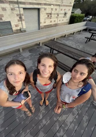 FRESH OUT OF THE POOL: Sophomores, Mia Schwartz, Lily Florence, and Gabby Clopaski wrap up their shift at the Circle C community pool. Schwartz started lifeguarding last summer and feels that this experience brightens her summer.