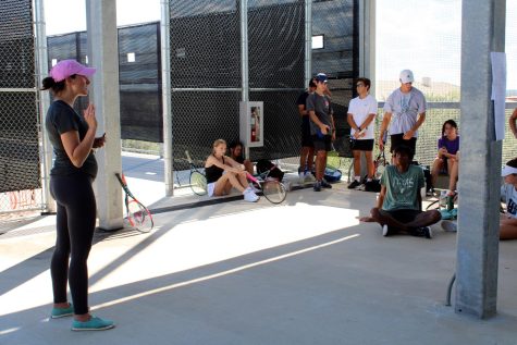 WATER BREAK: During tennis practice, Croll-Guard talks about the struggles and strengths of the practice to her team. 

“We usually start with dynamic warm up and stretching and then a repetitive drill, Croll-Guard said.

