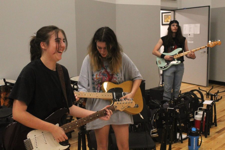 MAKING MUSIC: Students in the live music club rehearse in the band room after school.