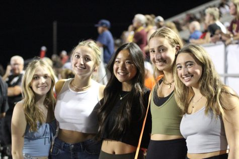 SUPPORTING THE STARS: Silver Star Alumni Riley Bennett, Estefania Betancourt, Lauren Chou, Emma Abelkis, and Sierra Greenberg (left to right) attend the homecoming game to support the current dancers during their halftime performance. 
