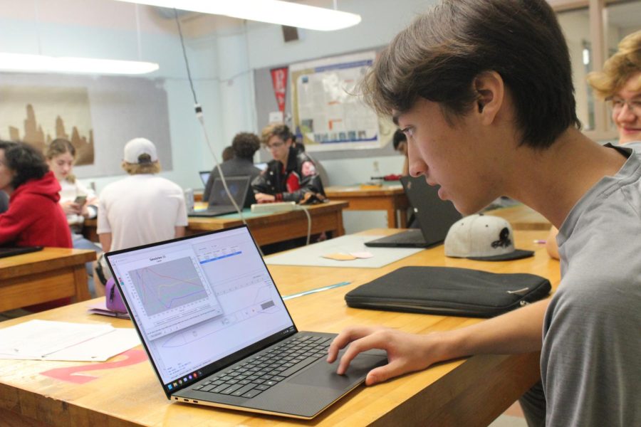 SIMULATION SUCCESS: Senior and founder of the rocketry club, Riley Peterson works with a rocket simulation to help track the success of his product. Peterson founded the club with the help of senior Laura Latt, in hopes to compete in the American Rocketry Contest in the spring.