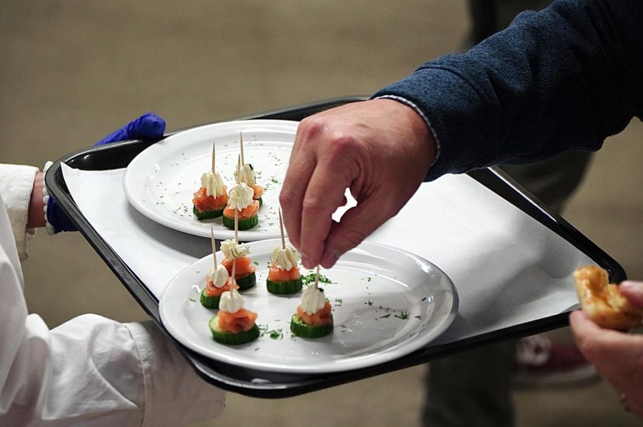 FOUR COURSES: The gourmet dinner consisted of four courses, including salmon cucumber bites as an appetizer. The meal was made by the culinary students during class, who were divided and assigned to different food production groups. 