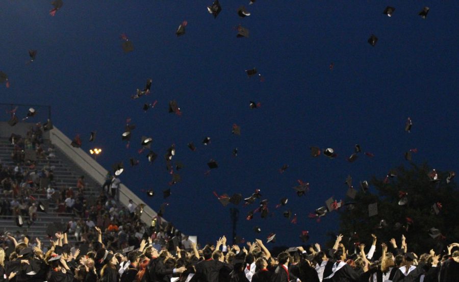 TOSSING CAPS: The graduating class of 2023 celebrate the end of their high school careers by throwing their caps into the air at the end of the ceremony. For many students, this long-standing tradition serves as a final moment of excitement among their peers. “The best message I learned at Bowie is that you should always try and meet new people,” senior Ben Locke said. “Making new friendships and connections doesn’t diminish the friends you may be away from at the moment. The other speeches at graduation showed me just how much pride Bowie students have in their school, and in the Bowie community.”