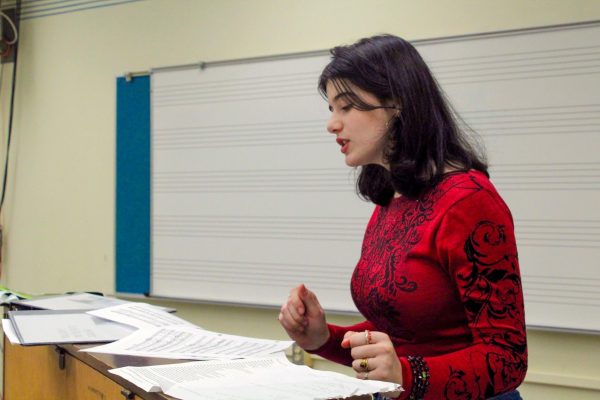 READING MUSIC: Abramovitch leads the altos in singing their part to remind them of pitches and tempo. “She has shown a lot of interest in helping with the leadership end of things,” Bourgeois said.