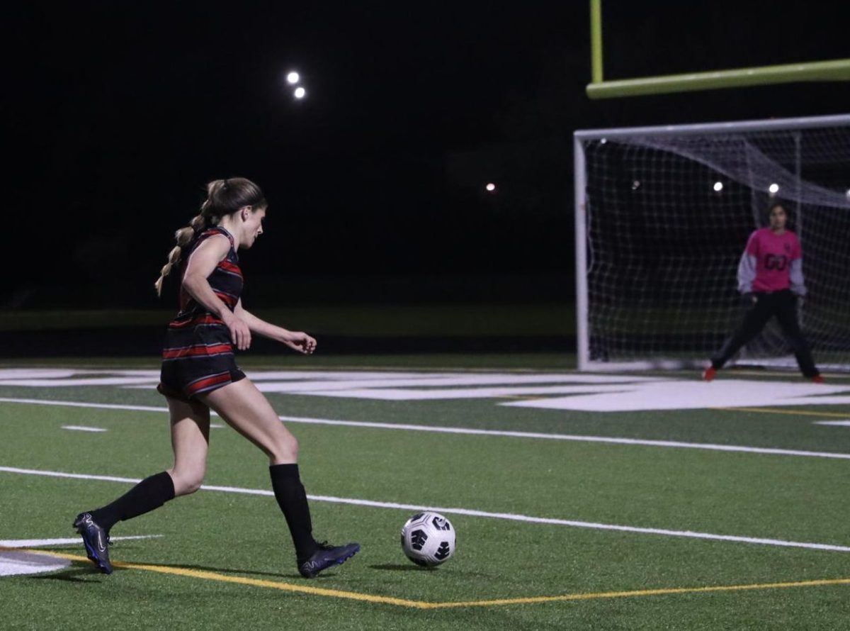 ON THE HUNT: Running towards goal, Ava Grosso keeps calm and readies herself to shoot. Grosso finished the season as the Lady ‘Dawgs top scorer.  