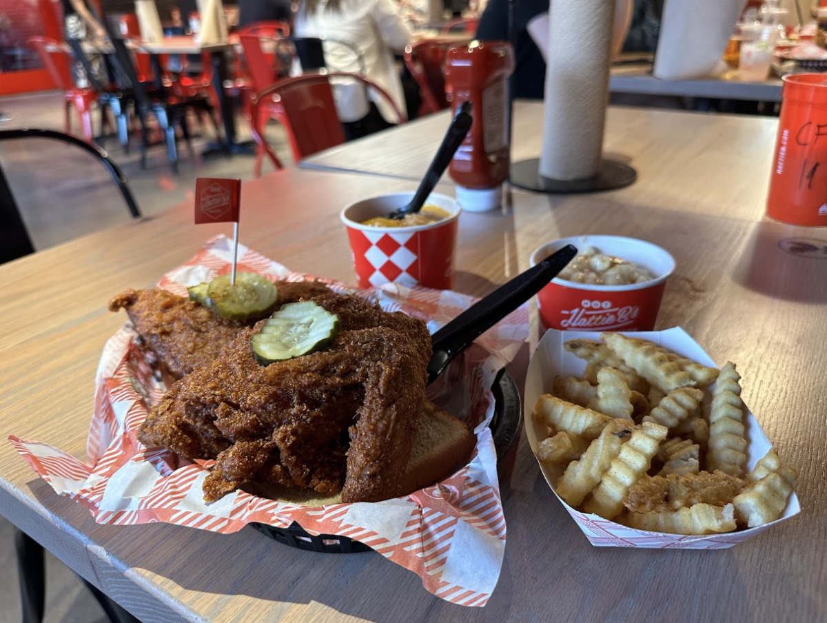 SALIVATION STATION: Delectable chicken and fries sits on the table at Hattie B’s Chicken, patiently waiting to be eaten. The restaurant was founded in Nashville, Tennessee, but opened their Austin location on Feb. 28, 2024. 