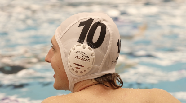 GEARING UP: Water polo player prepares for his upcoming practices. The team has only been playing since August and is showing major improvement.