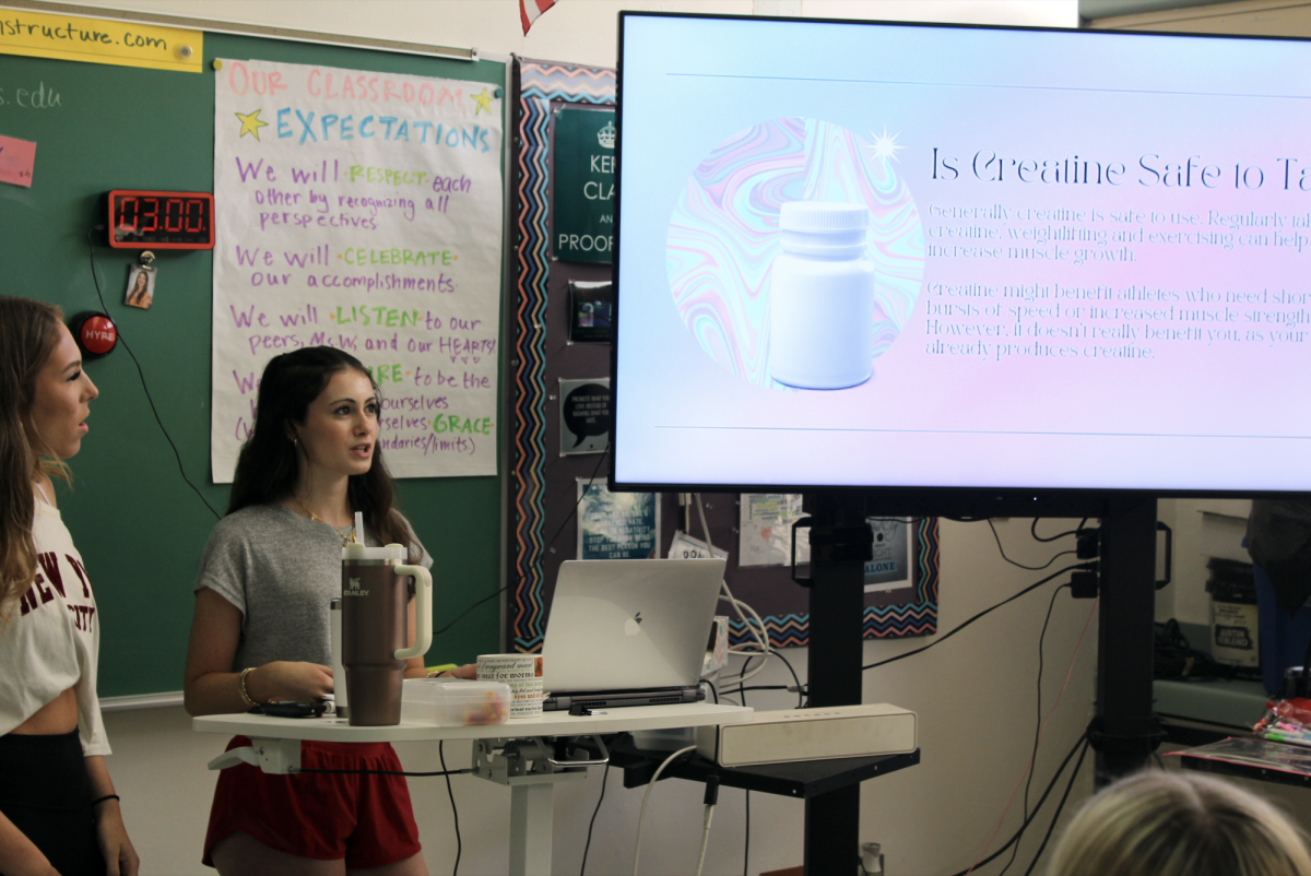 President and Founder of Girls Fitness Club Sarah Marcus leads a lecture on vitamins and supplements for members of the club. 