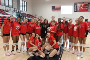 Varsity team poses together during practice for an upcoming game this week. 