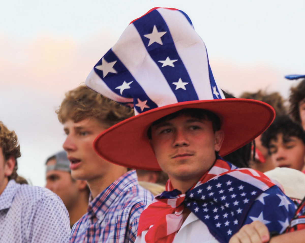 PATRIOTIC OUTFIT: Senior Josh Gonzales shows his patriotic spirit in his stars and stripes hat and accessories. Students also wore patriotic shirts, jackets, and body paint.  “American pride means a great deal to me as it symbolizes the values of freedom, opportunity, and resilience that define our nation,” Gonzales said. “It inspires me to honor our history while striving for a future that embraces diversity and equality for all.”