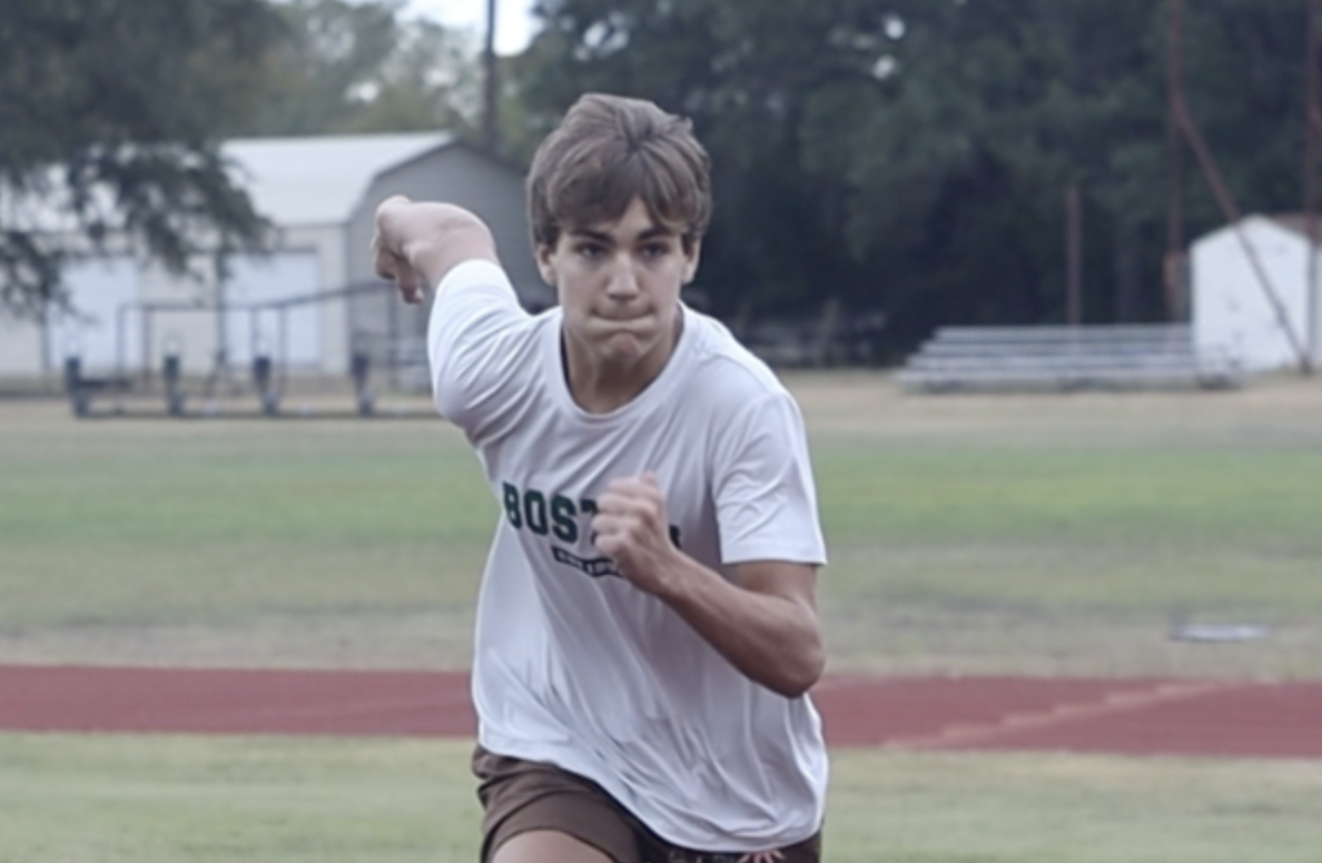 JUMPING FOR GOLD: Bowie runner Charlie Stinson trains for the high jumping event. Charlie trains multiple times a week resulting in his high performance in track.