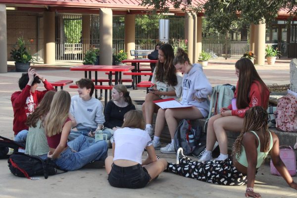 TO NEVERLAND: During rehearsal for Peter Pan, director Madigan Pound leads her actors through warm-ups and a brief snack. 